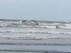 
      
      Boat with arms, ammunition recovered from Raigad beach
      
      