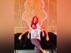 
      
      Farhan Akhtar poses in Swag with his wife Shibani Dandekar
      
      