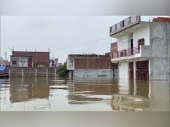 
      
      As Ganga, Yamuna level rises, water enters colonies in Prayagraj 
      
      
