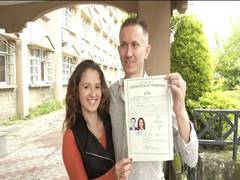 
      
      Make love not war: Russian-born man, Ukrainian wife's message 
      
      