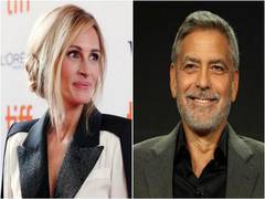 
      
      George Clooney jokes Julia Roberts about kissing in TTP
      
      
