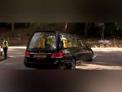 
      
      Queen Elizabeth's coffin begins 6-hour journey, crowds line...
      
      