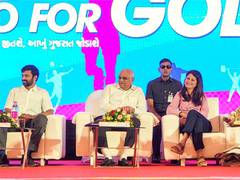 
      
       Gujarat CM doubles cash rewards, sets 'Go for Gold' target
      
      