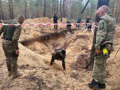 
      
      After Bucha, new mass grave of 440 bodies found in Ukraine 
      
      