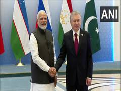 
      
      Uzbekistan President Mirziyoyev greets PM Modi as SCO summit...
      
      