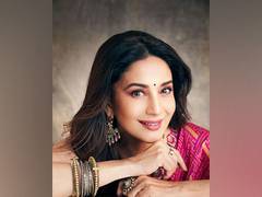 
      
      Madhuri Dixit looks ethereal in pink saree
      
      