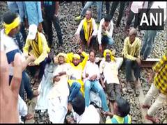 
      
      Kurmis' 'Rail Roko' protest demanding ST status enters Day 2
      
      
