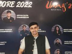 
      
      Shrinit Badiyani judges writing contest at NM Umang 2022
      
      