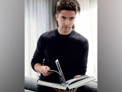 
      
      Topher Grace expecting third baby with wife Ashley Hinshaw
      
      