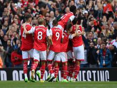 
      
      Arsenal thrash Tottenham 3-1, go to top of Premier League`
      
      