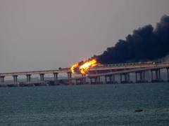 
      
      Crimean Bridge resumes limited road traffic after huge explosion
      
      