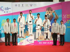 
      
      Mohit Sherawat clinches judo gold despite dislocated shoulder
      
      