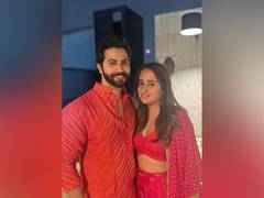 
      
      Karwa Chauth: Varun breaks his wife's fast by feeding her mithai 
      
      