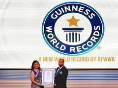 
      
      AFWWA creates world record by knitting 41,541 woollen caps
      
      