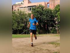 
      
      Be positive with flexible strategy, says running enthusiast  
      
      