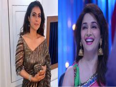 
      
      Kajol dances with Madhuri Dixit in latest video from Manish...
      
      