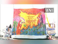 
      
      Bihar artists set up 21 ft long painting at Ganga river
      
      