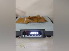 
      
      Two Indian nationals held with gold worth over crore in wax form 
      
      