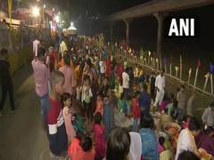 
      
      Devotees gather to offer 