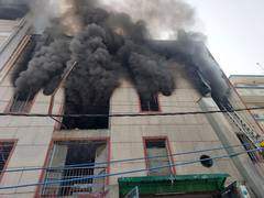 
      
      Owner of Narela footwear factory booked after fire kills 2
      
      
