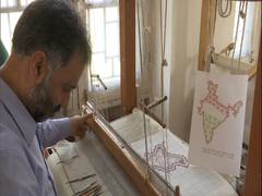 
      
      J-K: Artisans weave Kani shawl with India's map design 
      
      