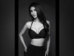 
      
      Mouni Roy raises temperature in white sleeveless top
      
      
