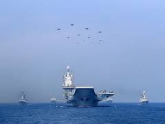 
      
      PLA bases in South China Sea battle the elements
      
      