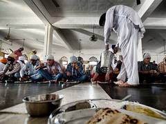 
    A look at food items prepared for Langar on Gurpurab
    