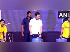 
      
      Rahu tries his hands at drum during Bharat Jodo Yatra
      
      
