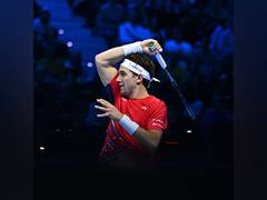 
      
      Ruud races past Rublev in Turin, sets Djokovic title clash
      
      