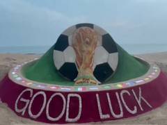 
      
      Sudarsan Pattnaik creates FIFA World Cup trophy's sand art
      
      