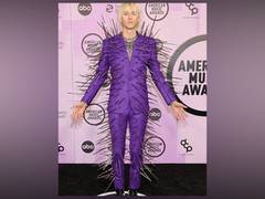 
      
      Machine Gun Kelly trolled on social media for his AMAs outfit
      
      