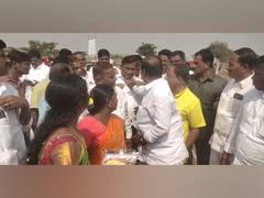 
      
      TRS MLA holds govt official's collar in viral
      
      
