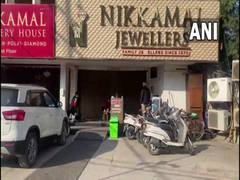 
      
      Income Tax raids premises of two jewellers in Punjab's Ludhiana
      
      