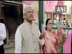 
      
      MP Governor Mangubhai Patel, Guj Min Purnesh cast their vote
      
      