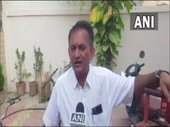 
      
      Congress MLA carries 'gas cylinder' on his bicycle to cast vote
      
      