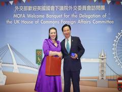 
      
      British MPs' Taiwan visit angers China 
      
      