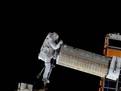 
      
      NASA astronauts install new roll-out solar array on station
      
      