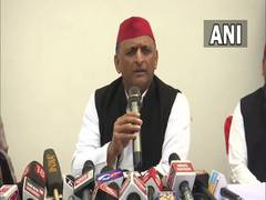 
      
      Akhilesh Yadav says photos show police lathi charge voters 
      
      