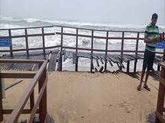 
      
      Mandous leaves behind inundated Marina Beach in Chennai
      
      