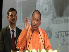 
      
      Yogi Adityanath attends Universal Health Cover Day
      
      