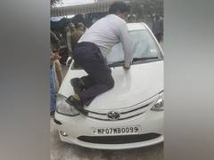 
      
      Car driver tries to hit traffic policeman in Indore
      
      