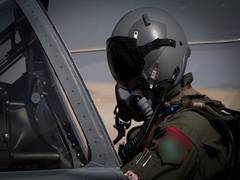 
      
      Ex-US pilot held in Australia
      
      