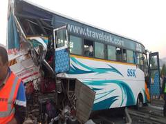 
      
      Maharashtra: 1 dead, 10 injured in bus, container collision
      
      