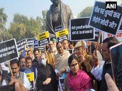 
      
      Sonia Gandhi, other Opposition leaders protest in Parliament
      
      