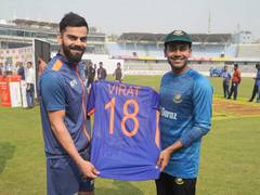 
      
      Bangladesh's Mehidy Hasan Miraz receives 