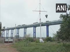 
      
      Storm Warning Cage 3 mounted at Pamban port
      
      