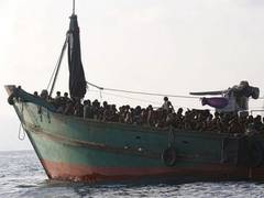 
      
      Boat carrying Rohingya refugees reaches Indonesia's Aceh
      
      