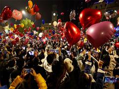 
      
      Thousands gather in China's Wuhan to celebrate New Year 
      
      