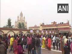 
      
      Devotees offer prayers at Dakshineswar Kali Temple
      
      